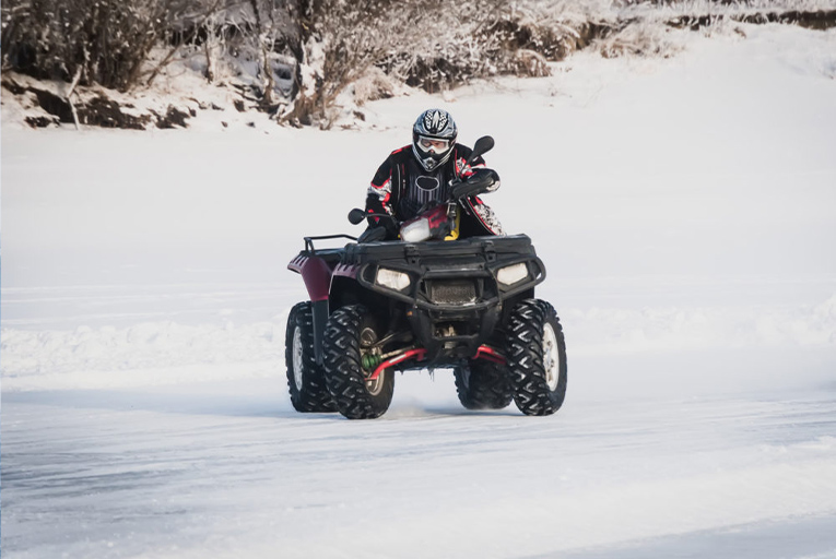 Couple having fun on ATV